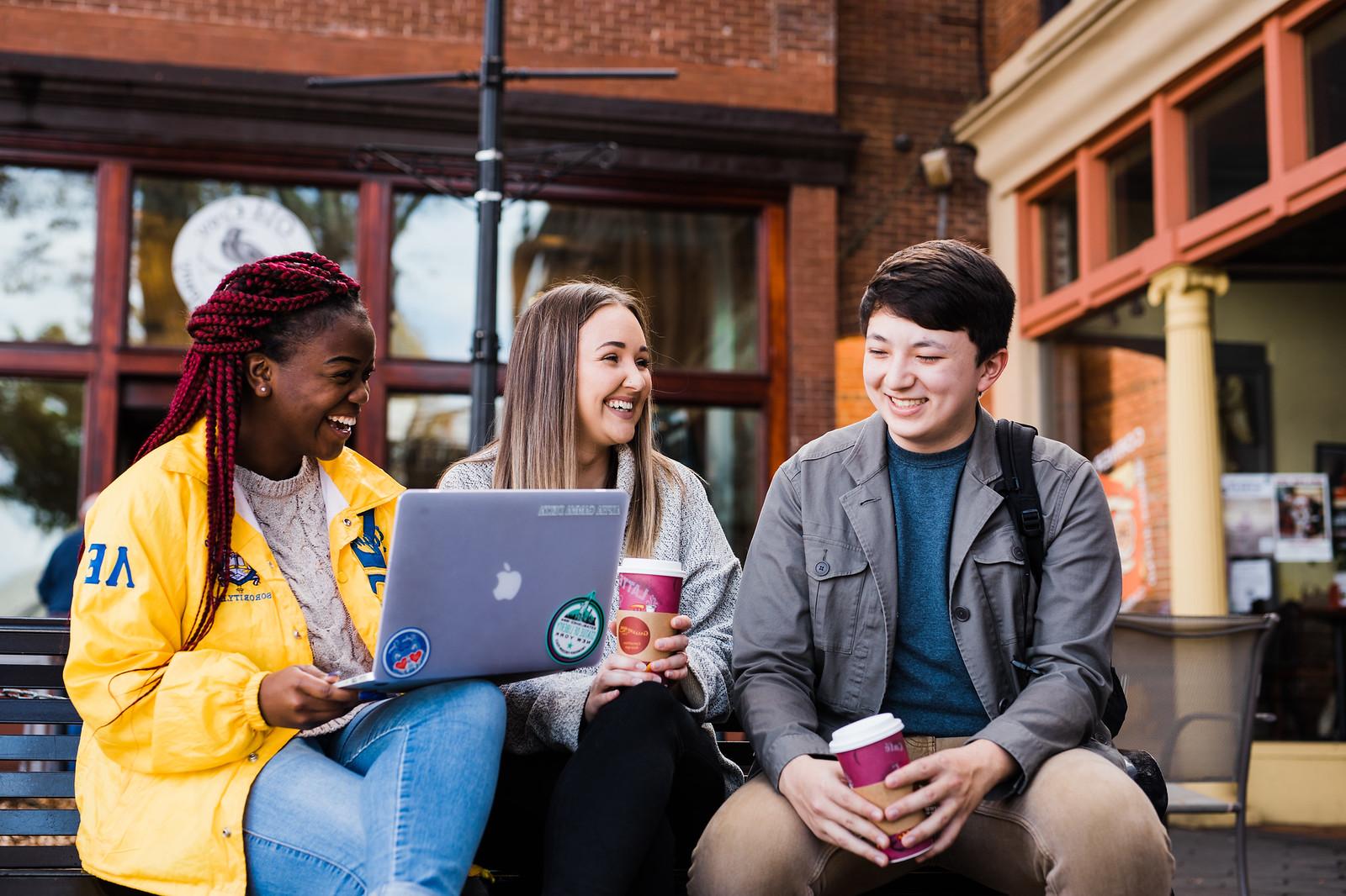 Three students having coffee